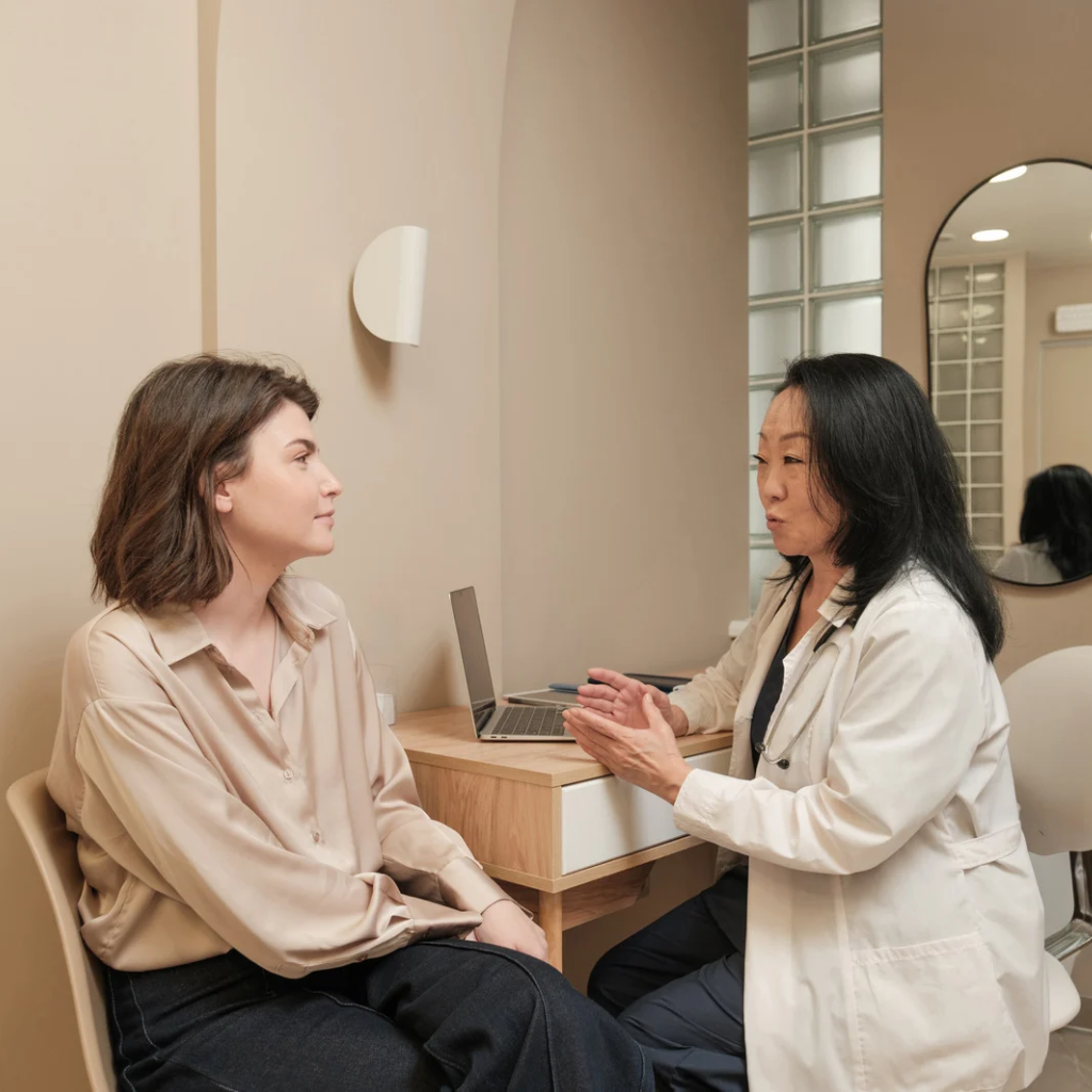 Patient speaking with a therapist during a session, showing the trust and communication that contribute to a good therapist fit.