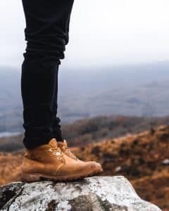 a person standing on a rock