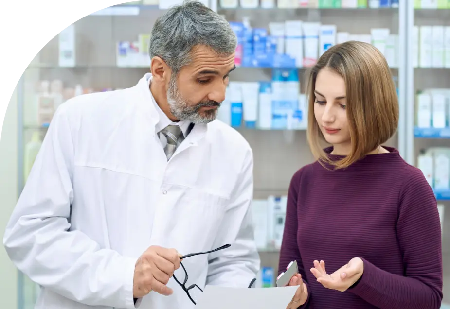 chemist explaining prescription woman drugstore 1