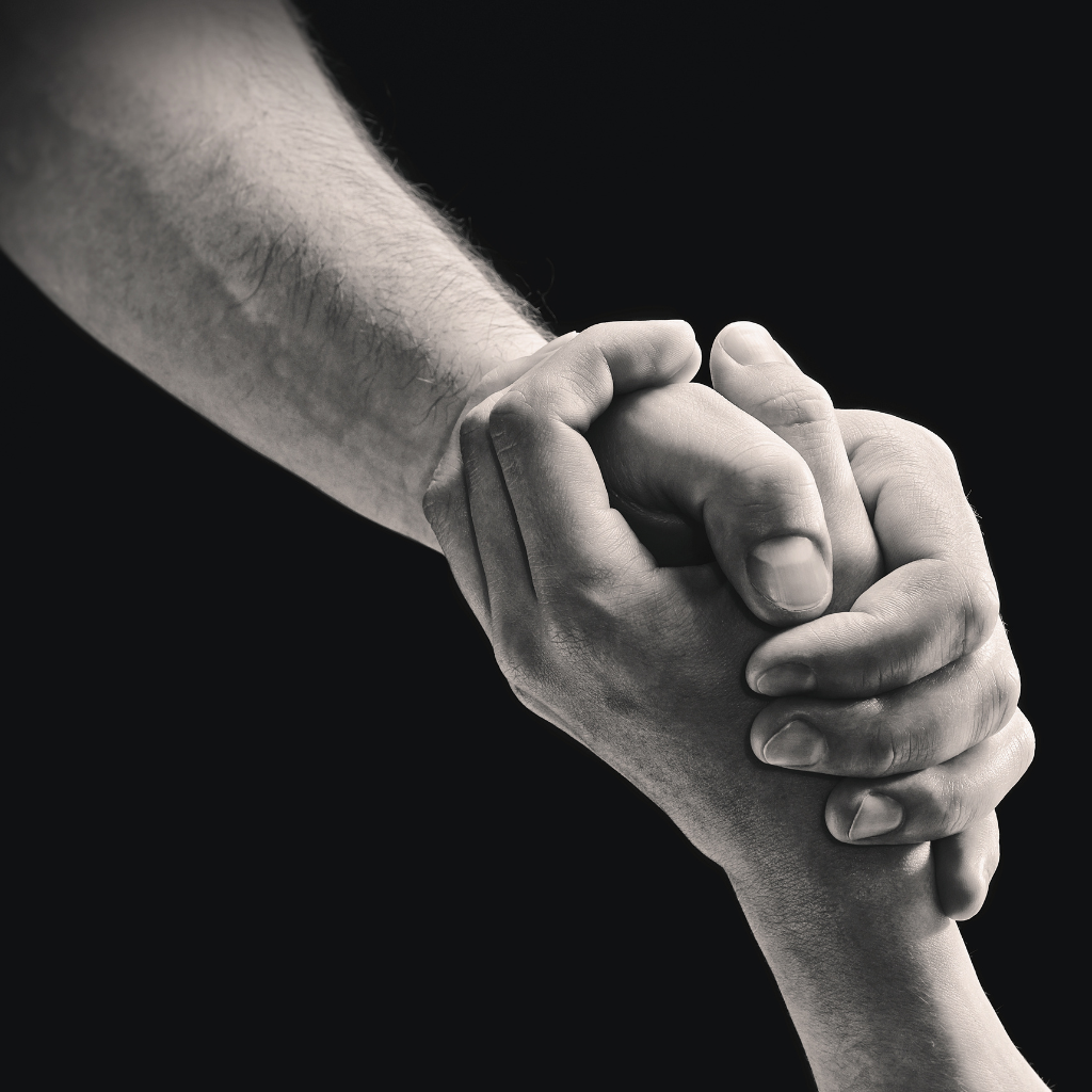 Mental Health Awareness Month: Spreading Awareness in May 2 Helping hand offering support during a mental health crisis.