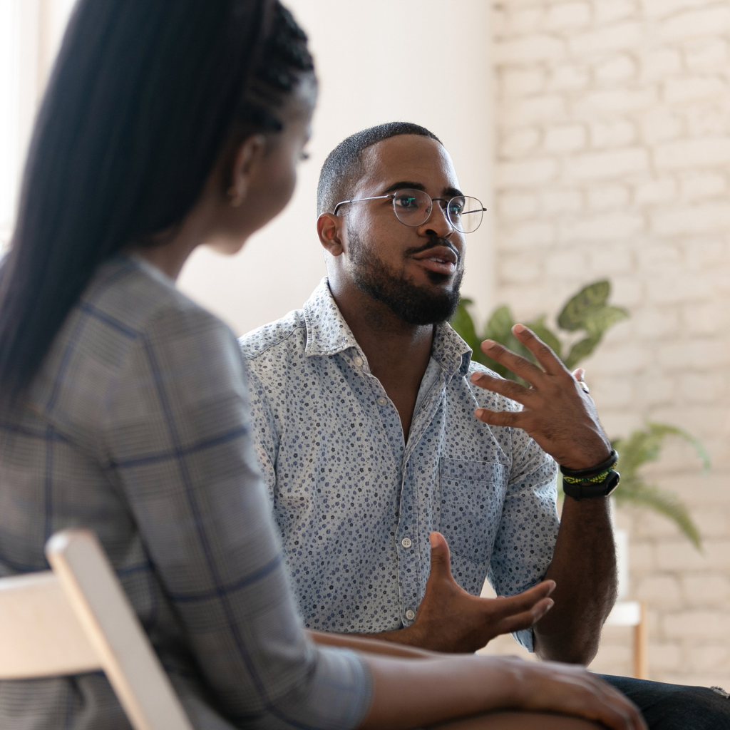 Beyond Distraction: CBT for ADHD Management 1 A man talking during Cognitive Behavioral Therapy (CBT) to seek help for his ADHD.