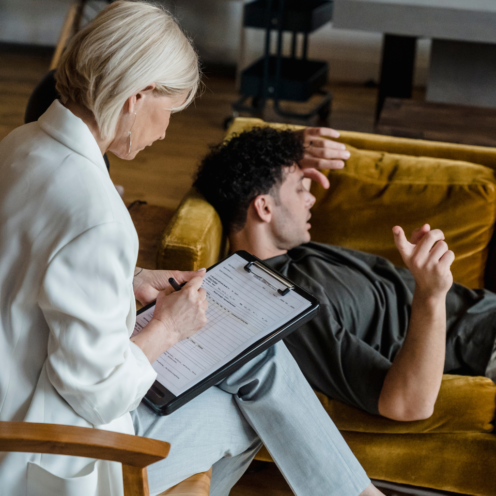 Understanding the Difference Between ADHD and ADD: A Comprehensive Guide 2 Man in therapy session