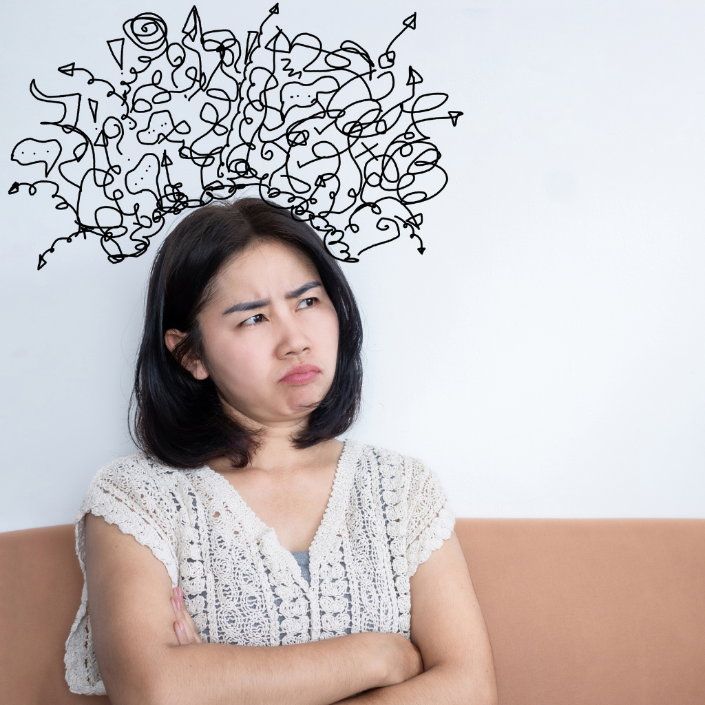 CBT for Intrusive Thoughts: Rewiring Your Mind 1 Woman overwhelmed by intrusive thoughts and mental clutter.