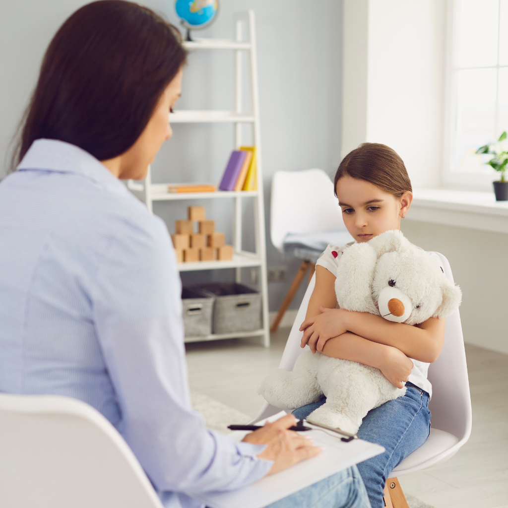 Understanding Anxiety Disorders in Children and Adolescents 2 Child in therapy holding a stuffed animal, representing early support for anxiety in children