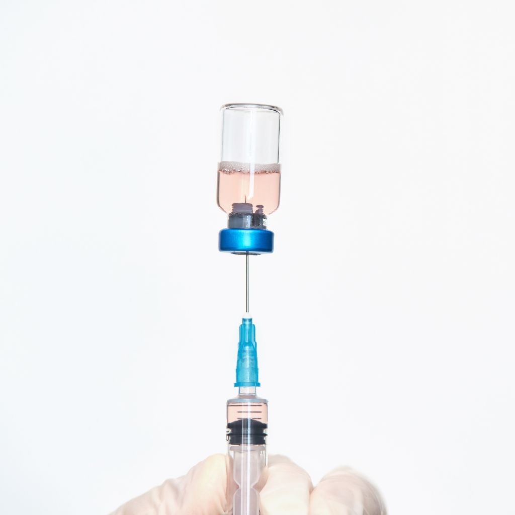 Antipsychotic medication being prepared as a long-acting injection for consistent mental health treatment.