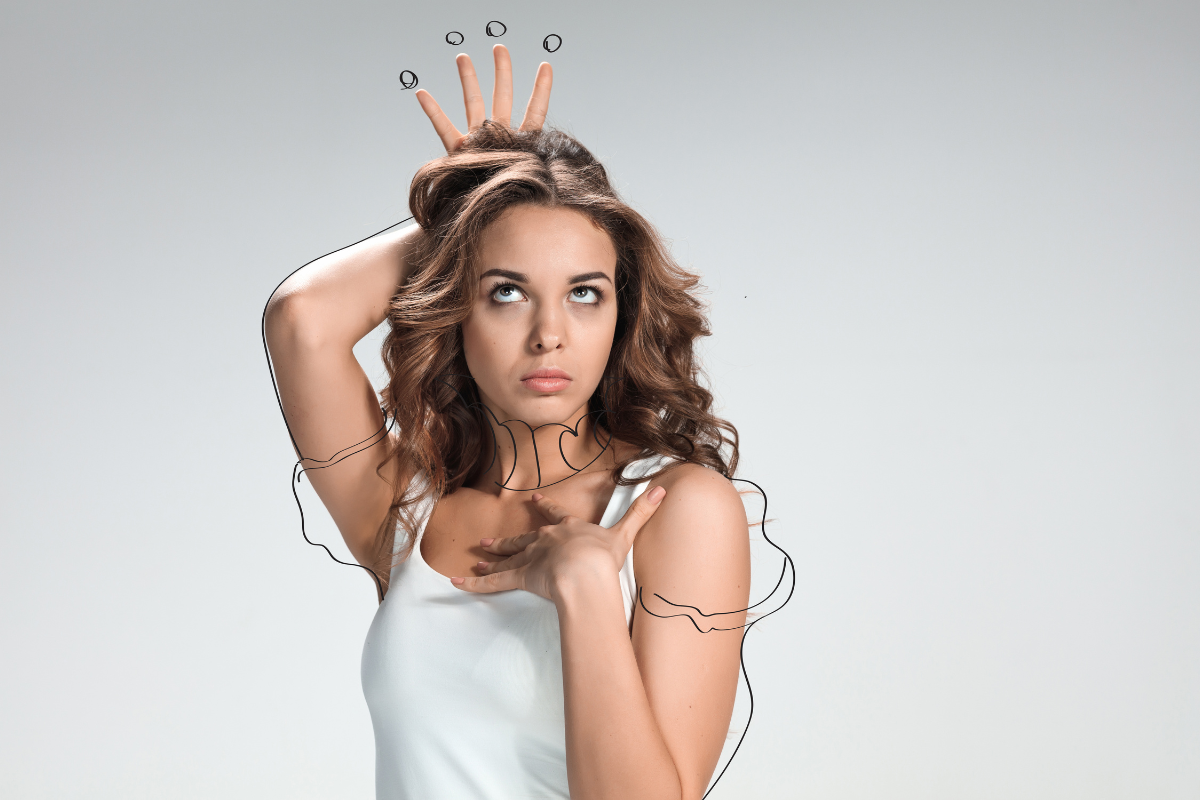 Woman striking a confident pose with a playful expression, reflecting common stereotypes about narcissism.