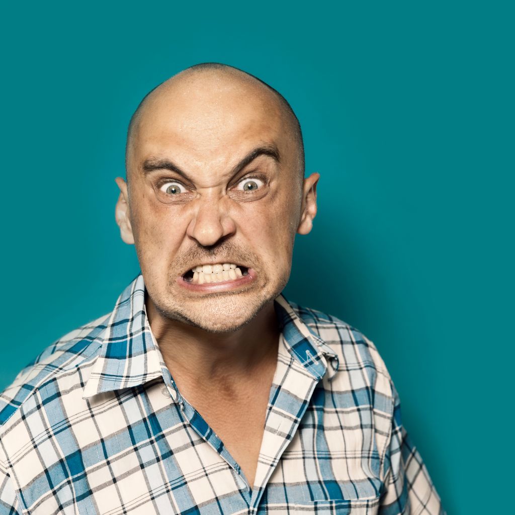 Depression in Men, and Emotional Suppression: Unpacking the Silent Struggle 1 Man showing intense anger and irritability.