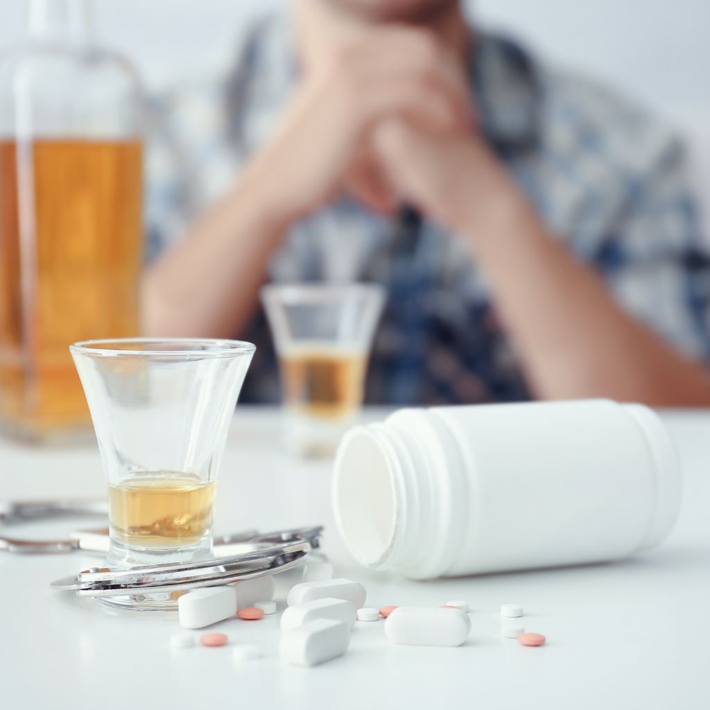 What Is Dual Diagnosis? Understanding the Overlap Between Mental Health and Substance Use 1 Depressed man taking drugs and alcohol.