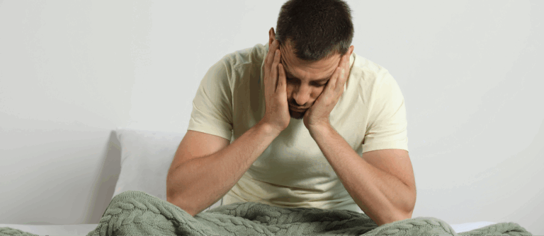 a man sleepy and unhappy