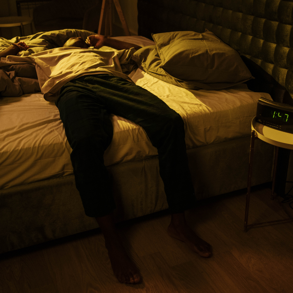 The Vicious Cycle of Depression and Sleep: Breaking the Pattern 1 Person struggling to sleep at night