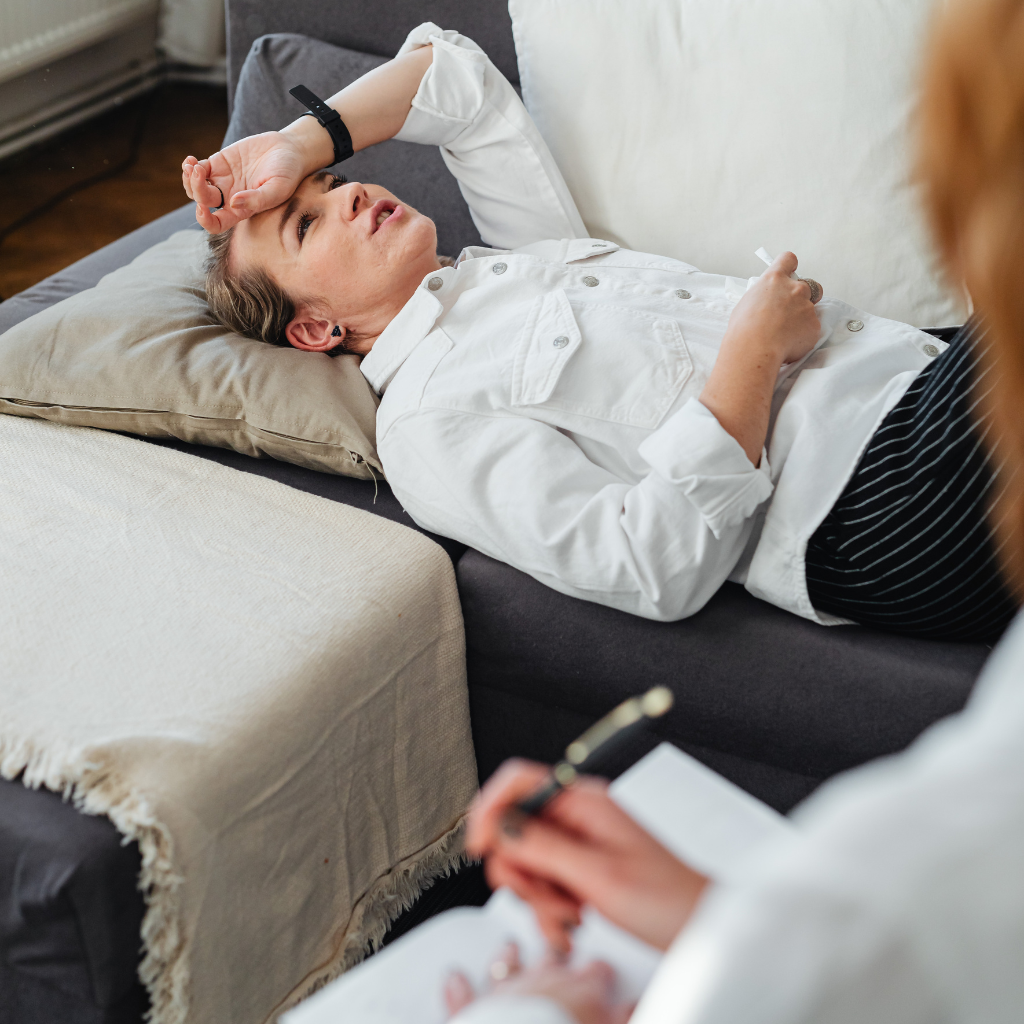 Person discussing depression and sleep treatment with a therapist.