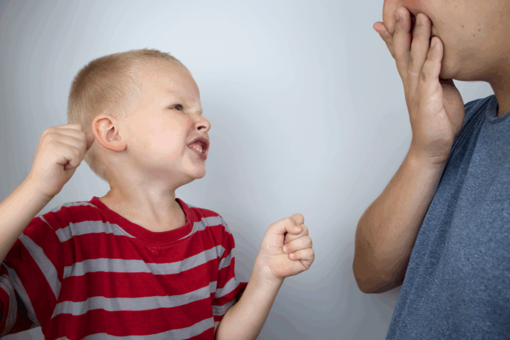 Understanding Oppositional Defiant Disorder in Children 2 Child yelling at an adult, showing defiant behavior linked to ODD.