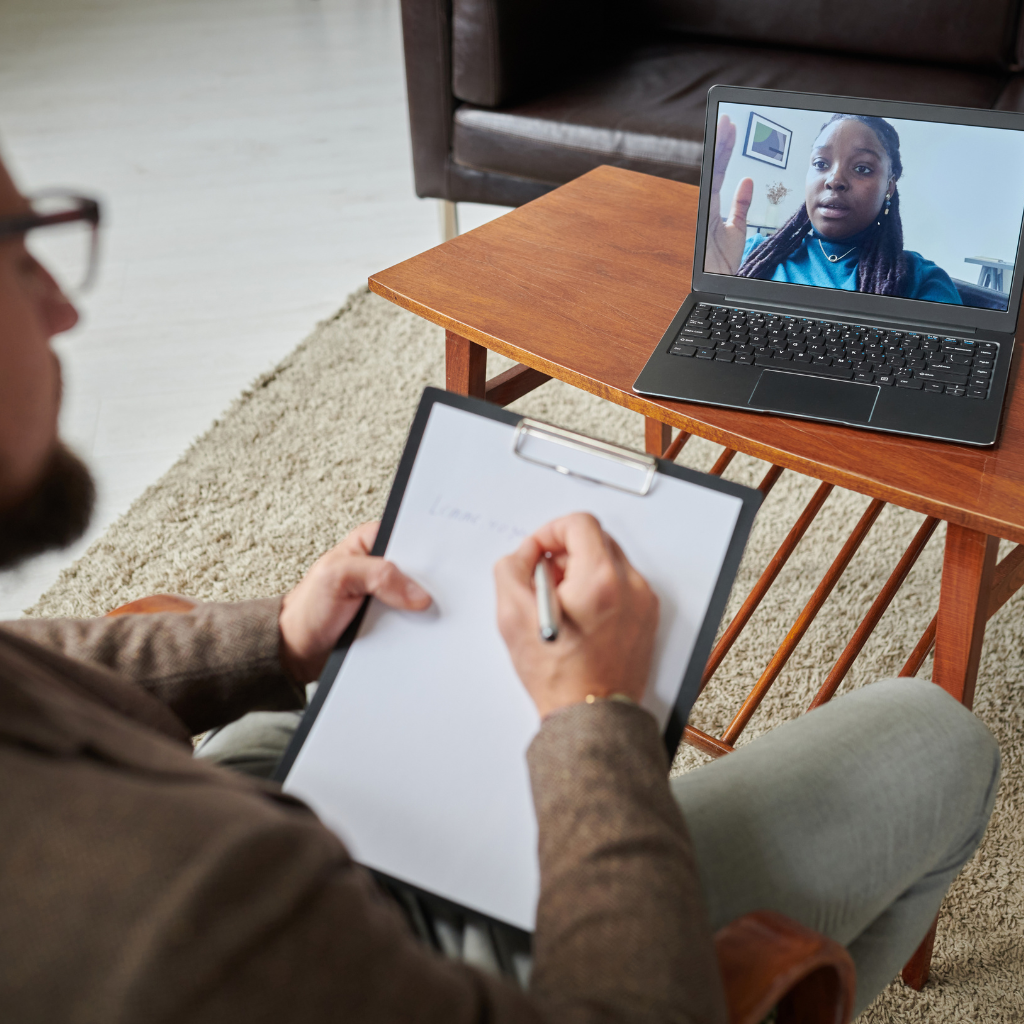 patient and psychotherapist undergoing online therapy