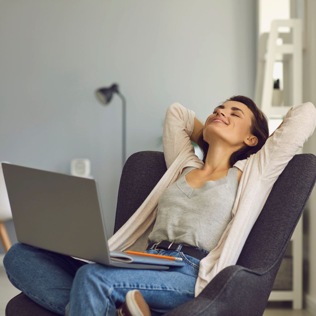 Woman leaning back with eyes closed, showing relief and improved well-being after TMS treatment for high-functioning depression.