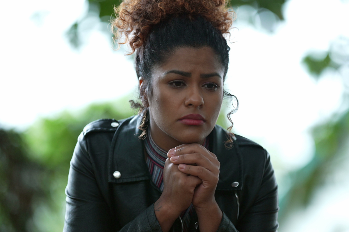 Woman appearing tense and reflective, illustrating anticipatory anxiety
