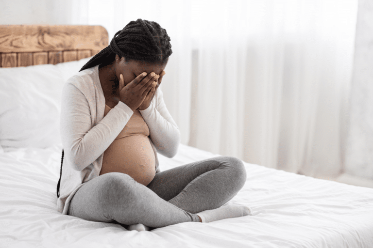 Pregnant woman experiencing emotional distress during peripartum depression