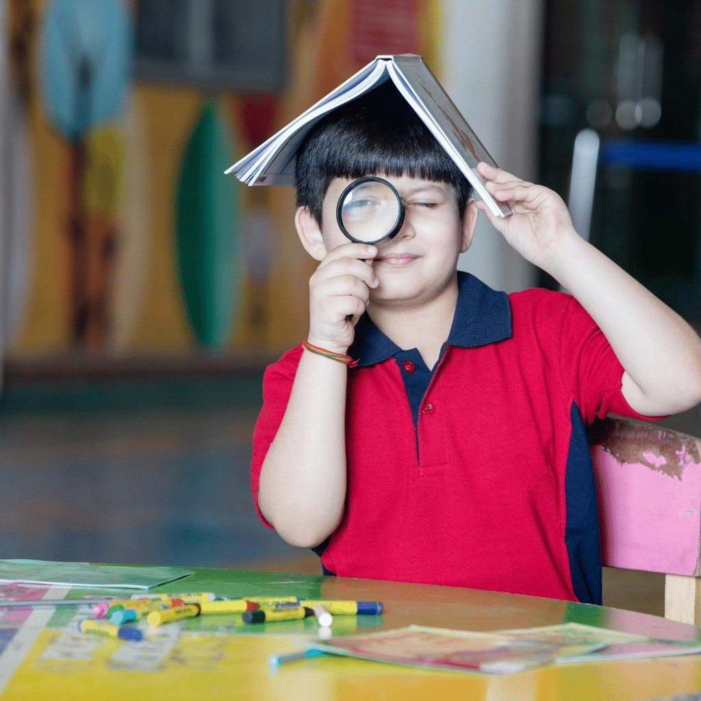 Child engaging with learning materials in a playful but distracted way, reflecting common early ADHD symptoms like inattention and impulsivity.