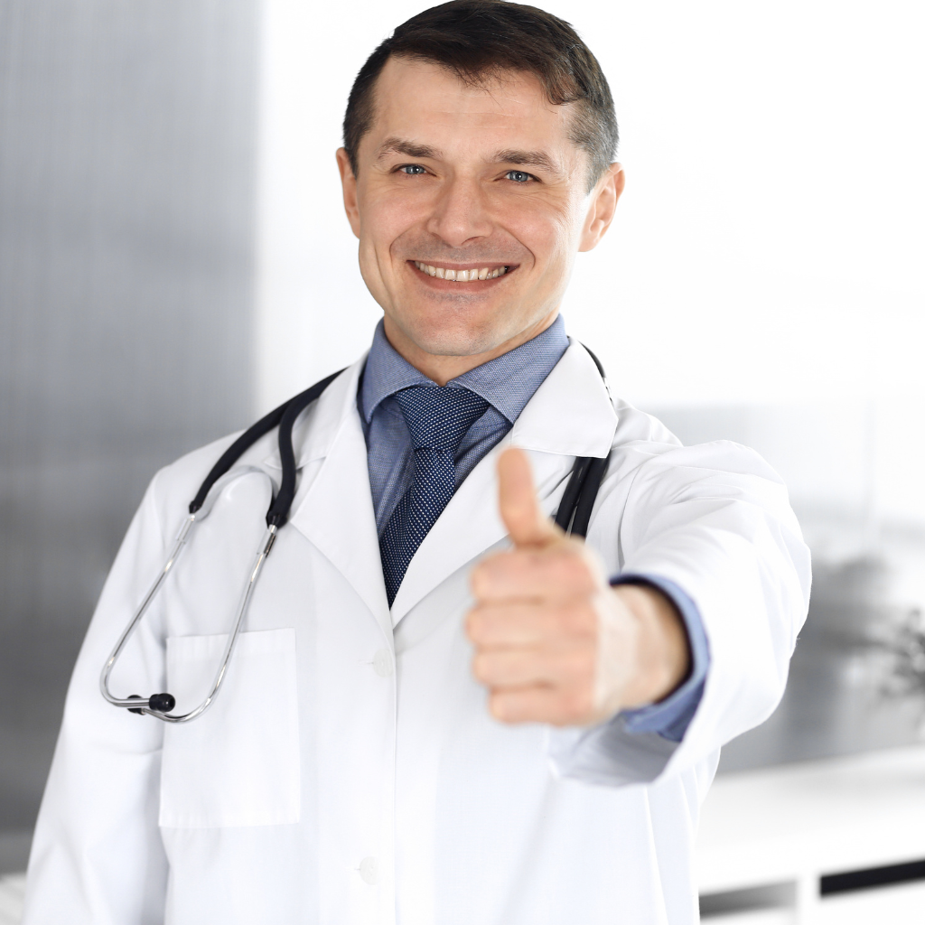 Physician giving a thumbs up symbolizing medical approval and evidence supporting TMS therapy.