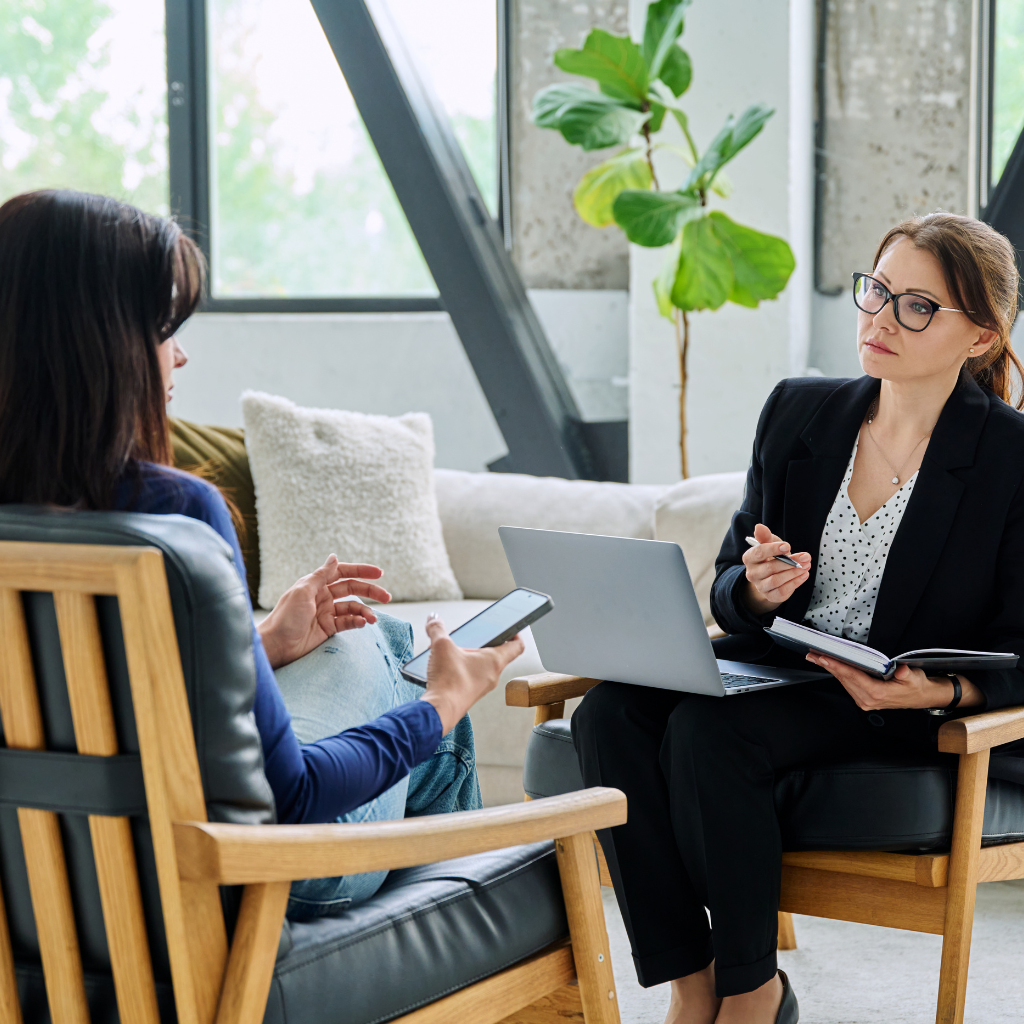 Cognitive Disengagement Syndrome vs ADHD: What Makes Them Different and Why It Matters 2 patient and therapist discussing treatment options for cognitive disengagement syndrome vs ADHD