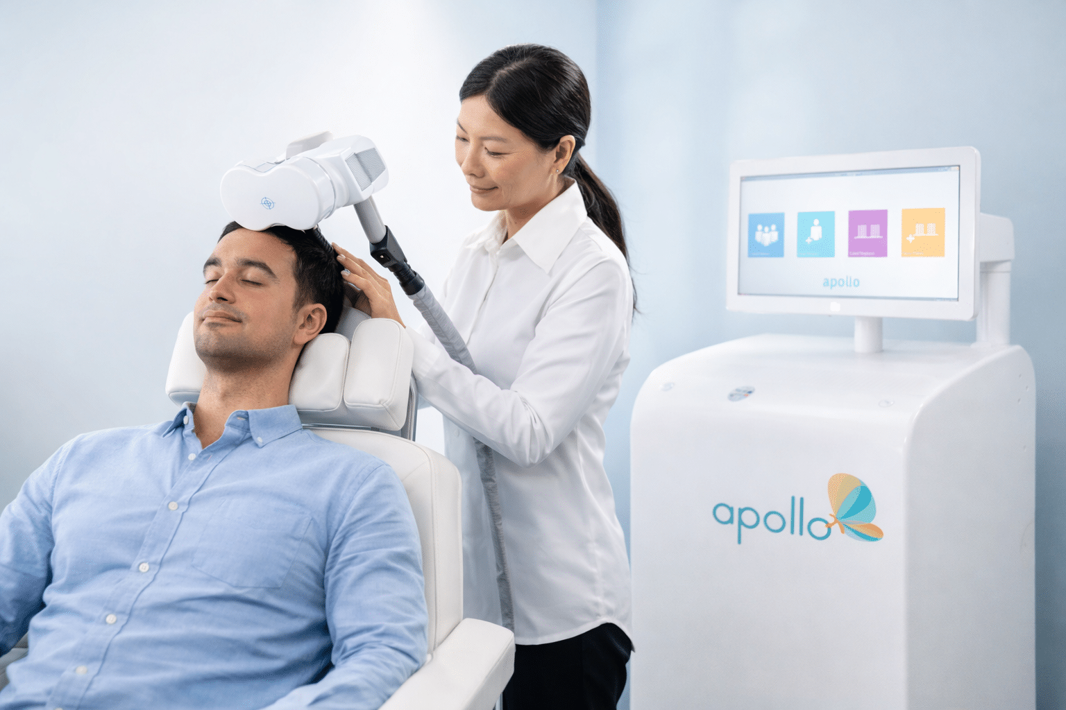 person receiving TMS therapy during a treatment session