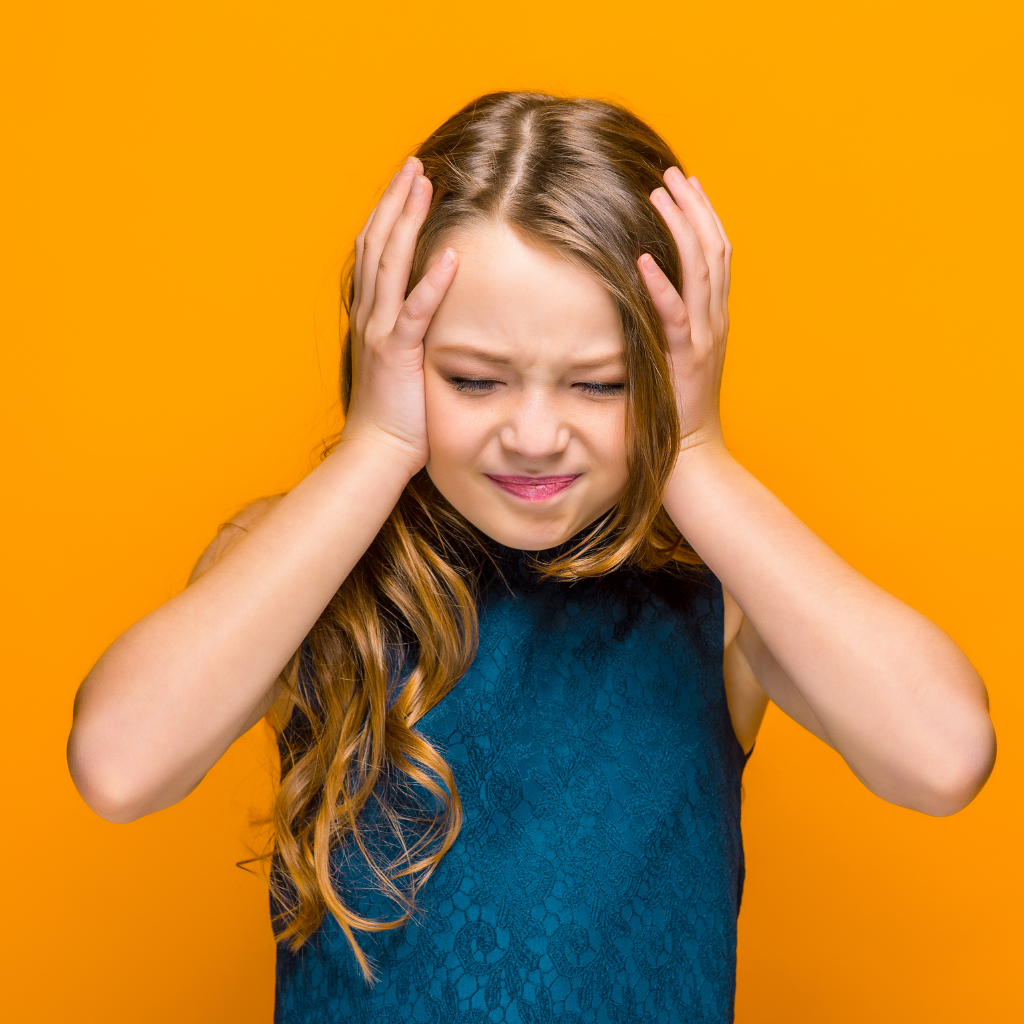 Borderline Personality Disorder in Children: Early Signs, Diagnosis, and Support 1 Young girl showing signs of emotional overwhelm and distress.