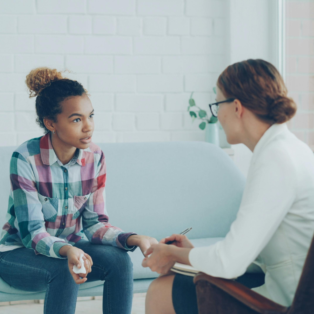 Girl being evaluated for ADHD by a mental health professional.