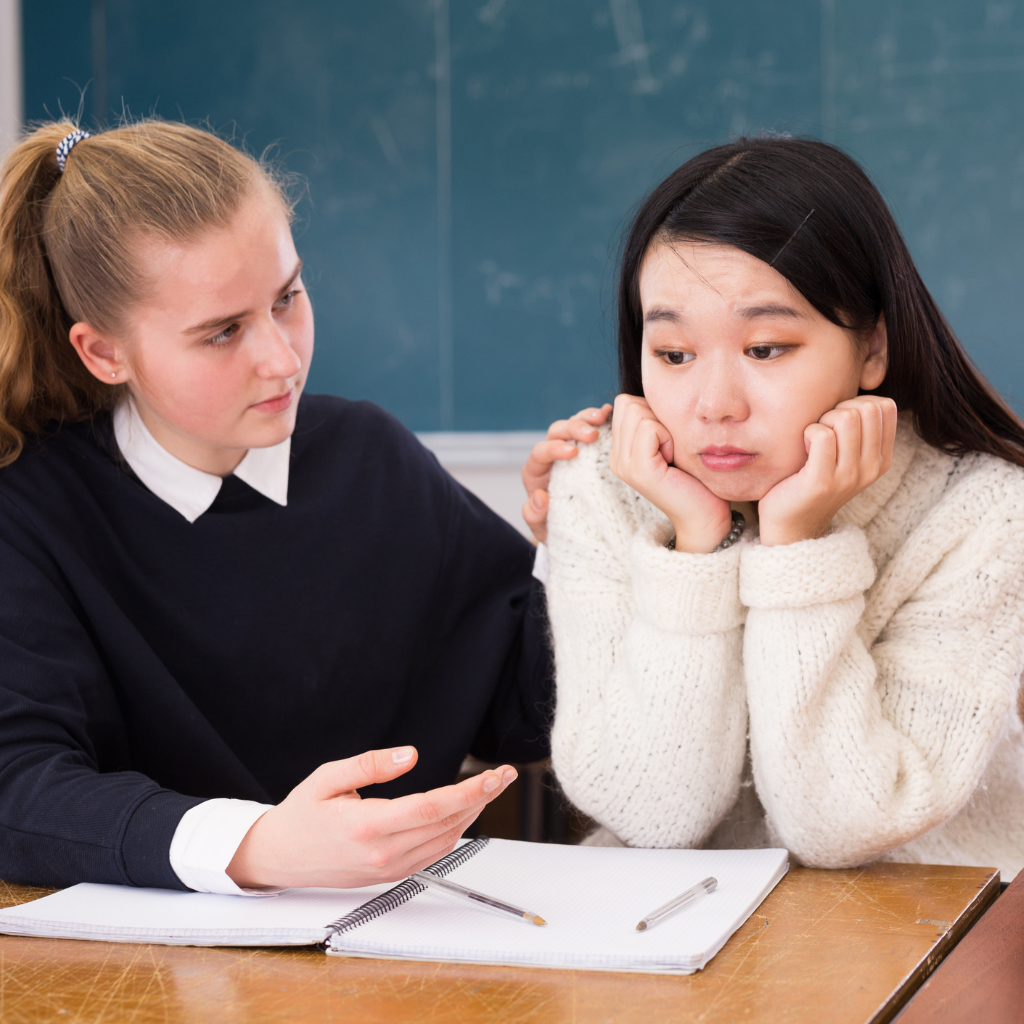 Girl with ADHD in class showing quiet inattention and internalized struggles.