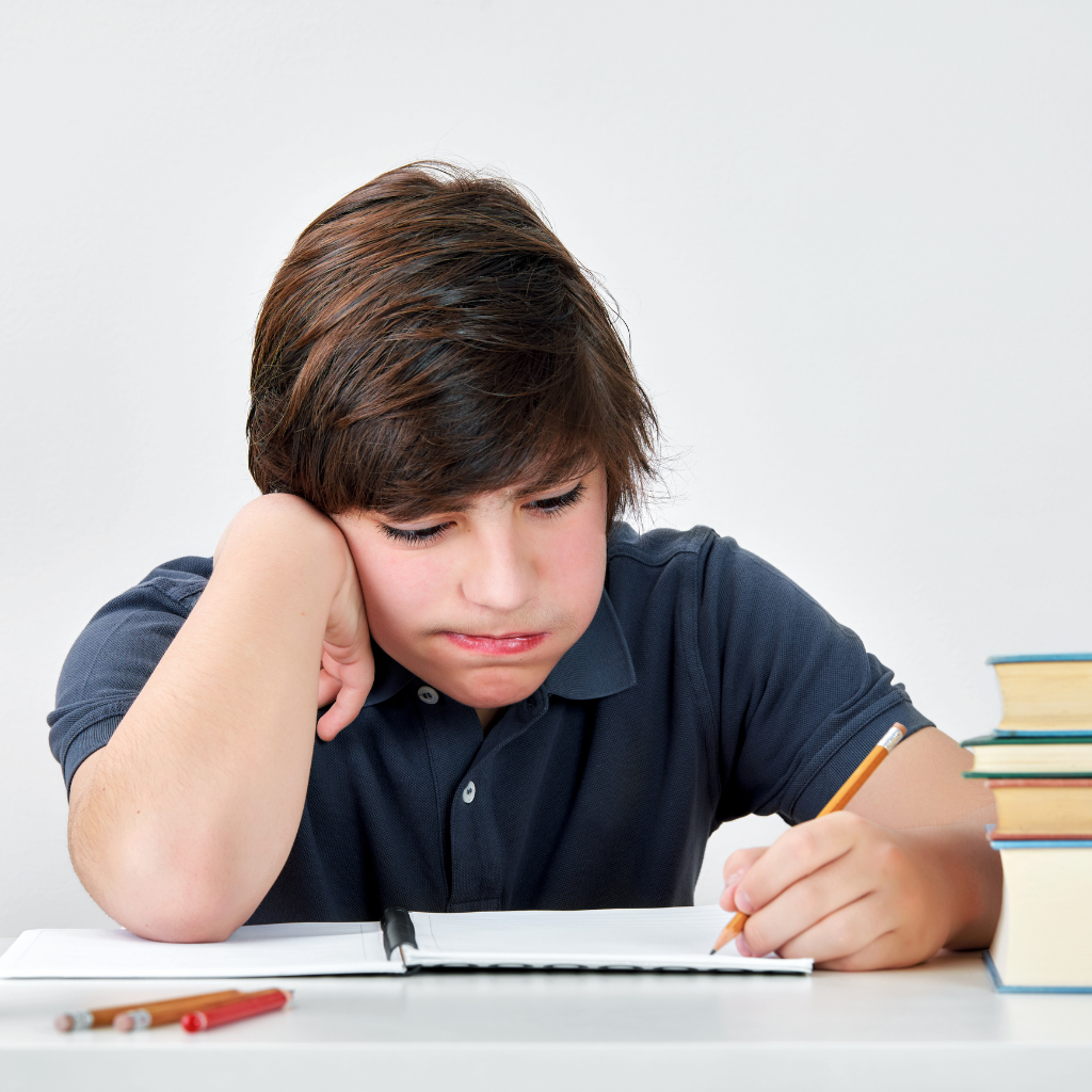 Child with challenges in executive functioning in children during schoolwork.