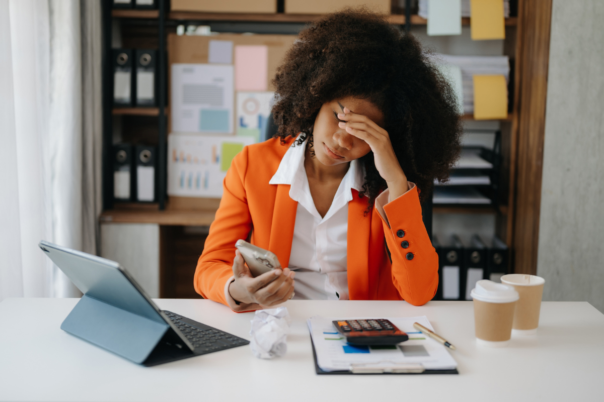 Professional feeling overwhelmed by high-functioning anxiety at work.