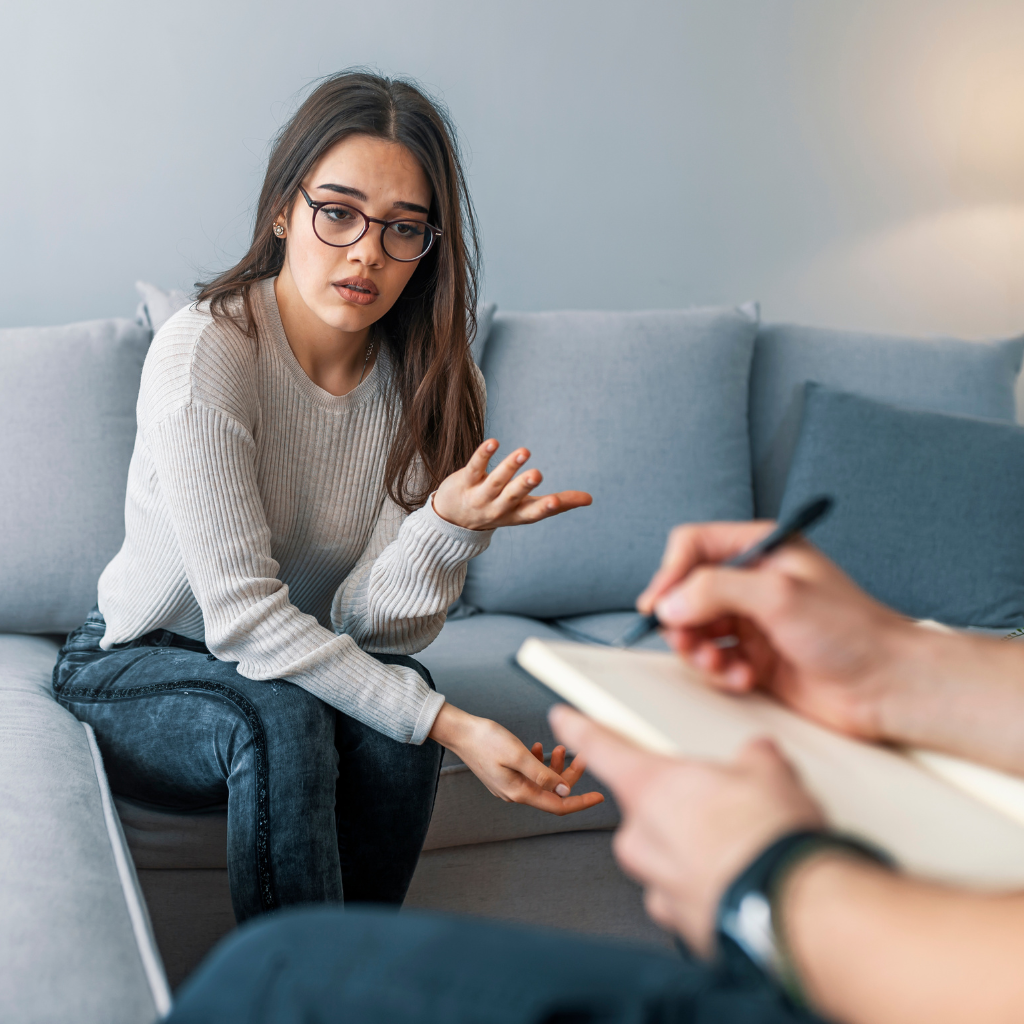 Person suffering from depression seeking treatment from mental health professional 
