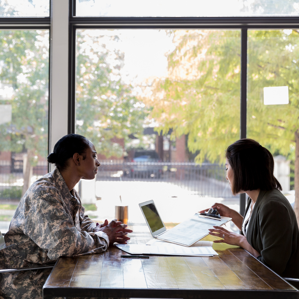 Patient discussing what to expect from TMS for PTSD with a provider.