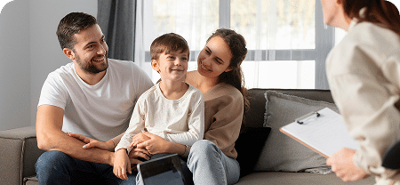 close up family discussing with therapist 3 1