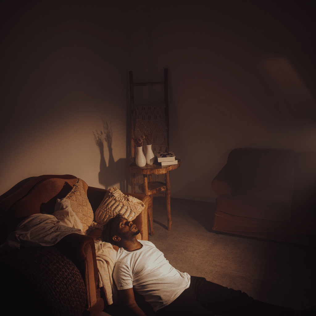 Person experiencing anhedonia and emotional disconnection from depression.