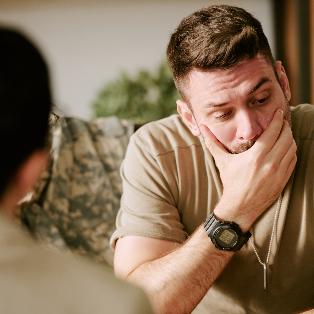 Military service member in conversation about mental health support, career concerns, and maintaining readiness.