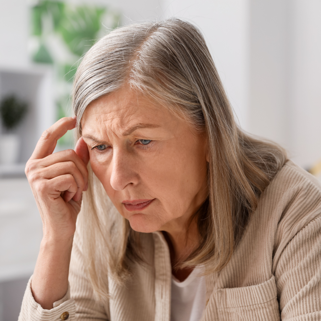 Late-Life Depression: What Families Need to Know 1 Older woman appearing confused and concerned, showing cognitive changes that can occur with late-life depression in older adults.