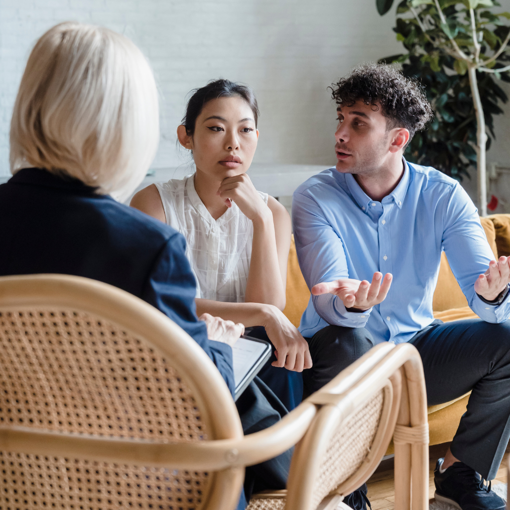 Couple speaking with a therapist about BPD splitting and relationship communication.