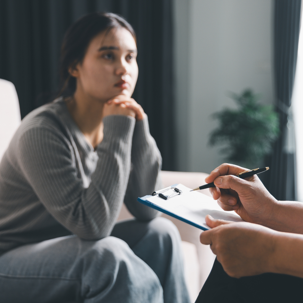 TMS Therapy Treatment Timeline: What to Expect Week by Week 2 Patient speaking with a provider about next steps when TMS treatment progress feels slow.