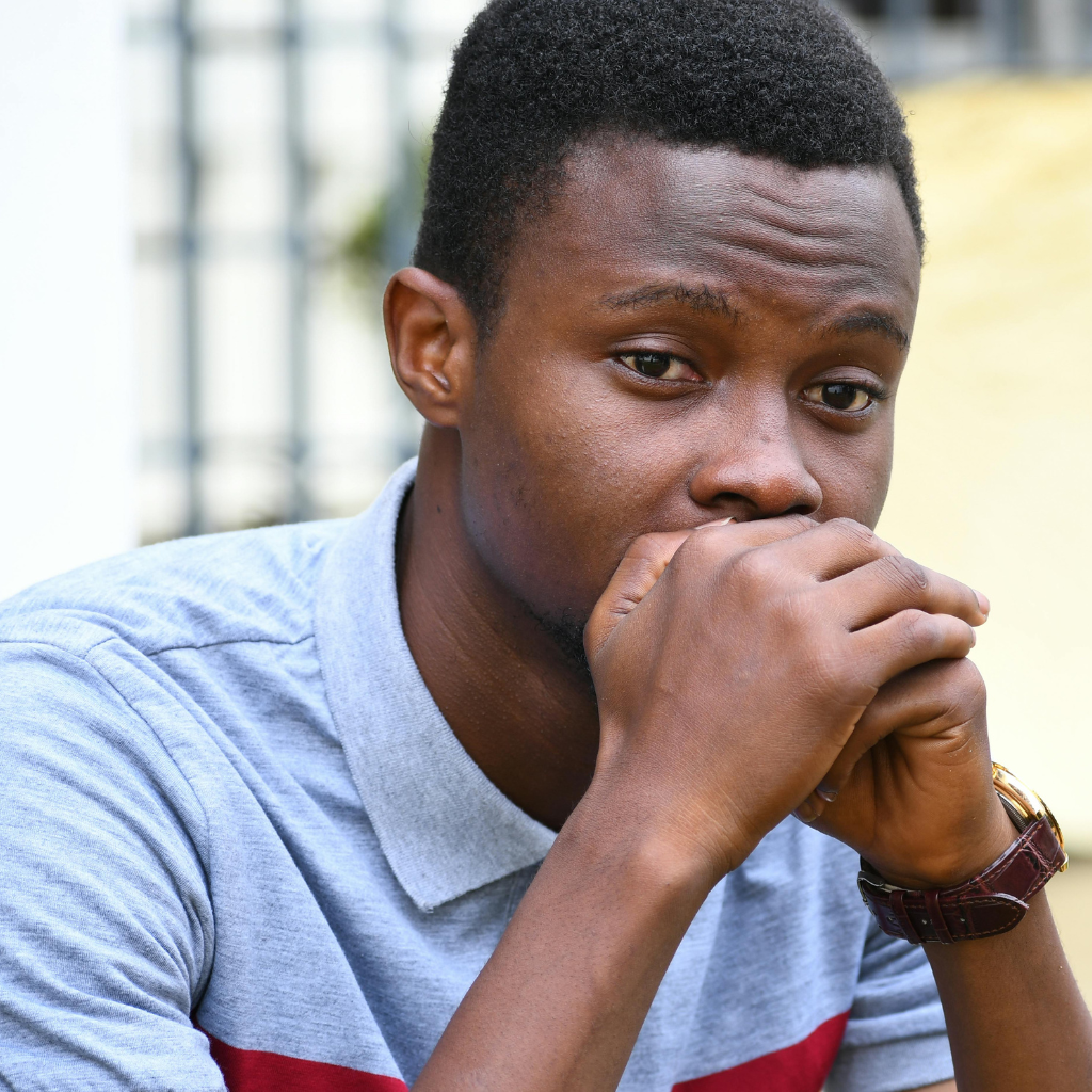 Man looking thoughtful and worried, reflecting how normal worry can point to a real concern before it settles.