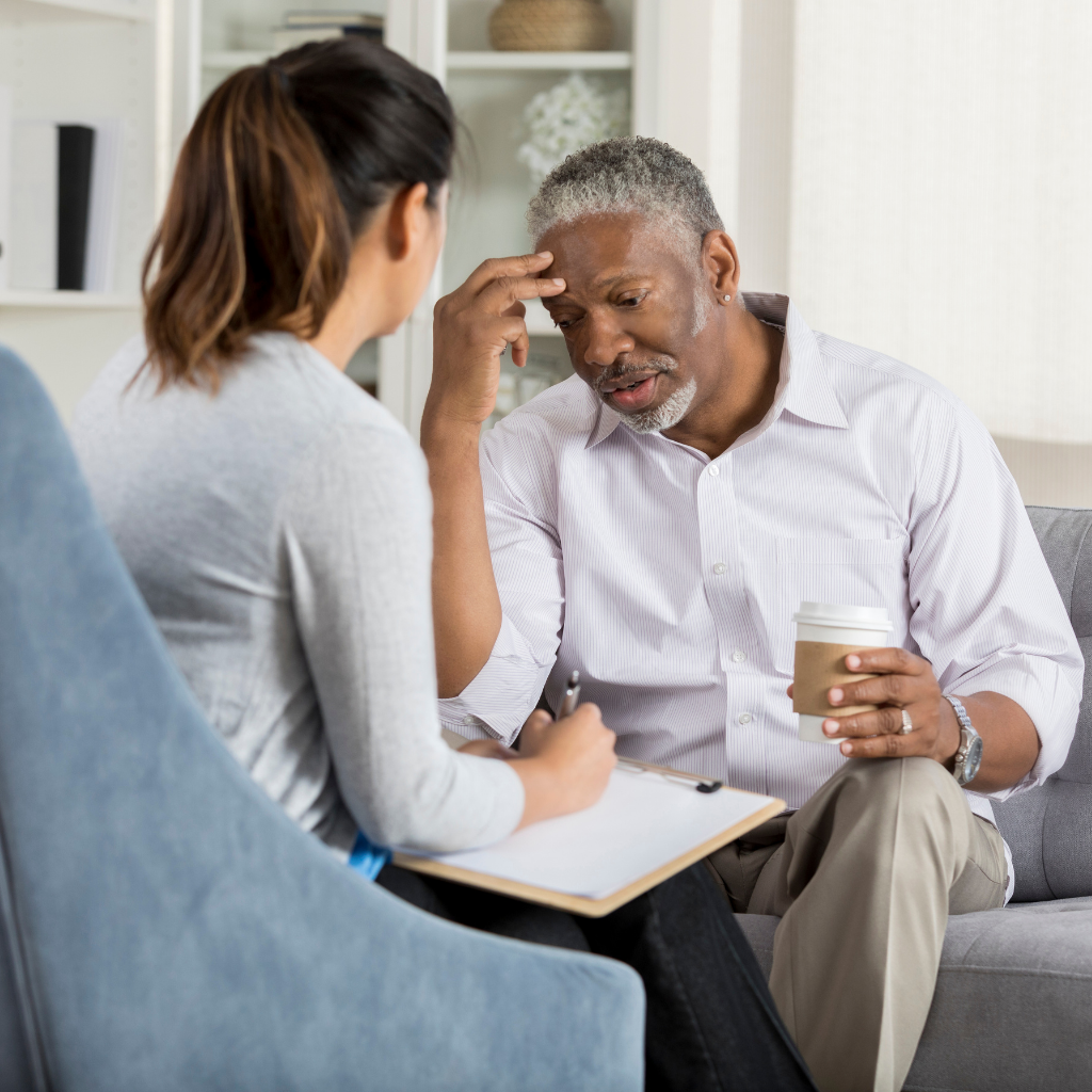 Person speaking with a therapist about scrupulosity OCD, showing how ERP can address religious fear without challenging faith.
