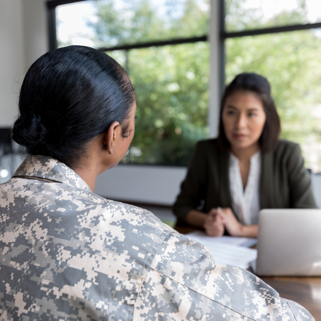 When a Veteran Refuses Mental Health Help: What Family Can Do 2 Veteran speaking with a healthcare professional about treatment options and support.